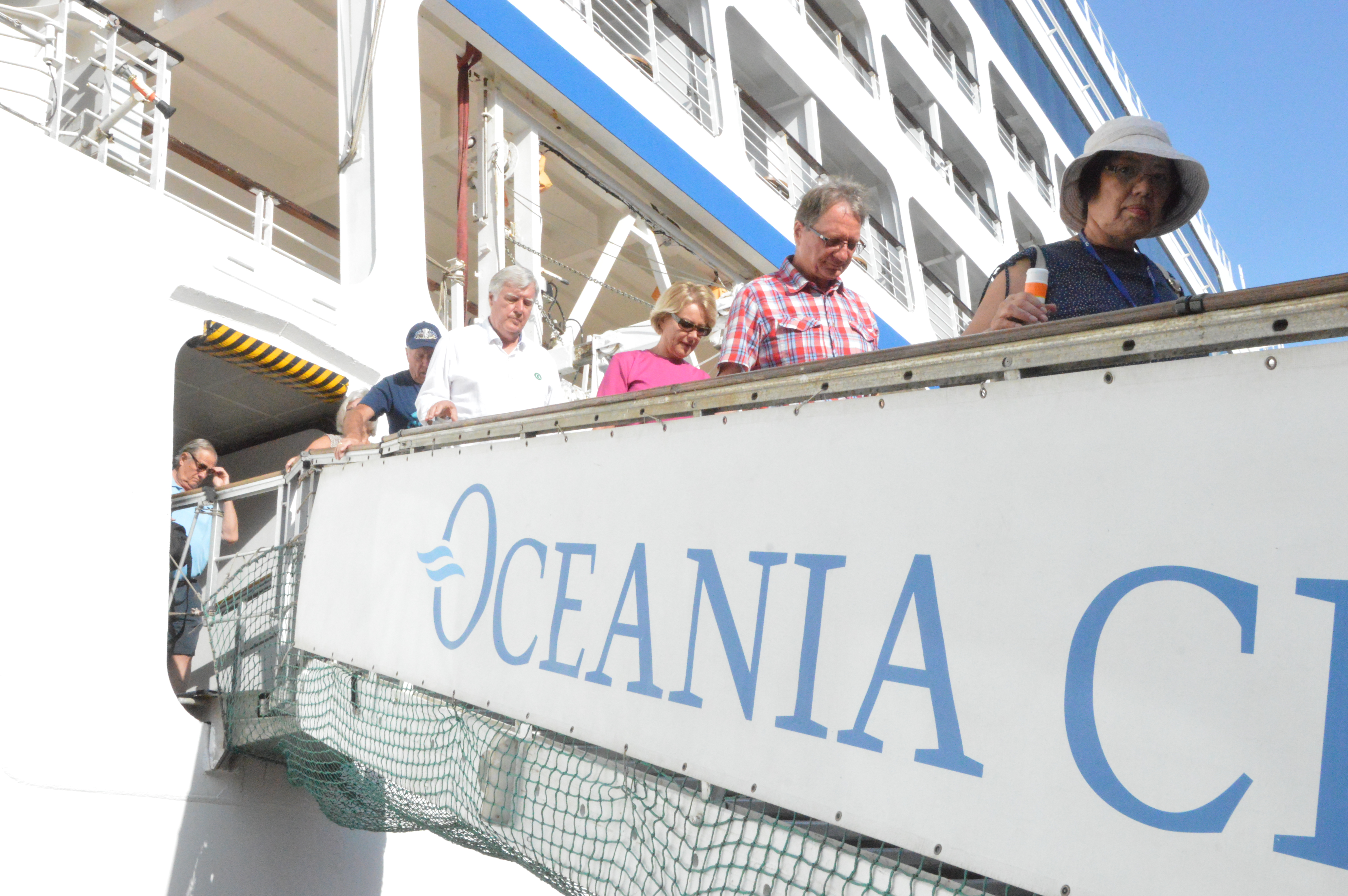Tourists disembarking from the vessel.JPG