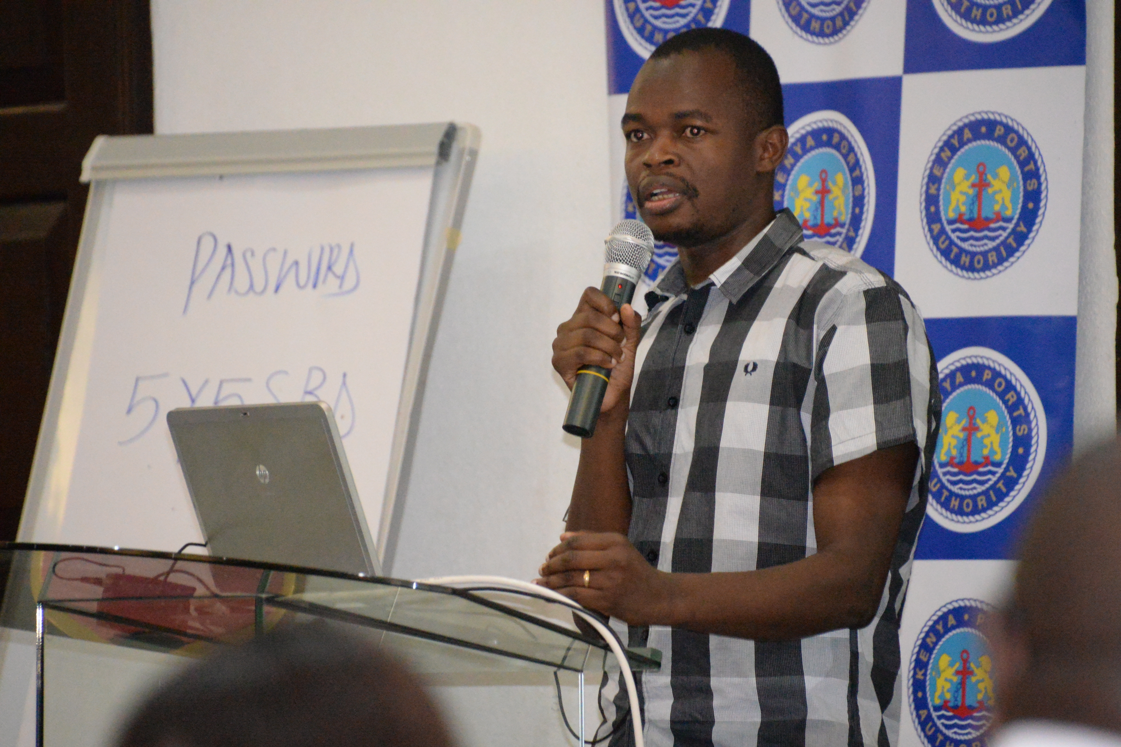 Mr. O of Kenya Revenue Authority making a presenntation on SCT.JPG