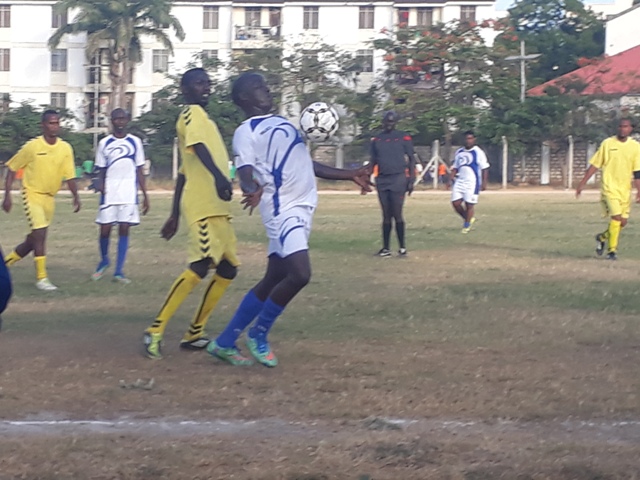 Terminal Operations striker Antony Kimani fights for the ball.jpg